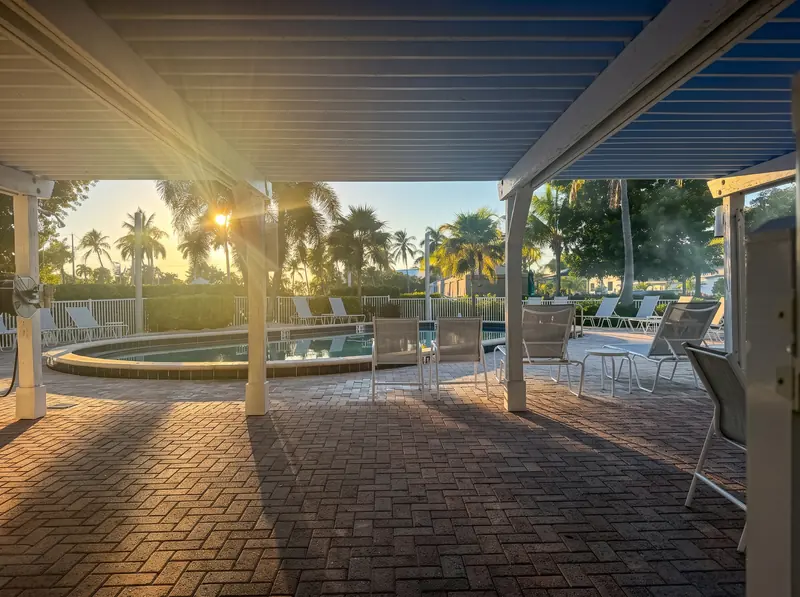 Shaded pool pavilion at sunrise