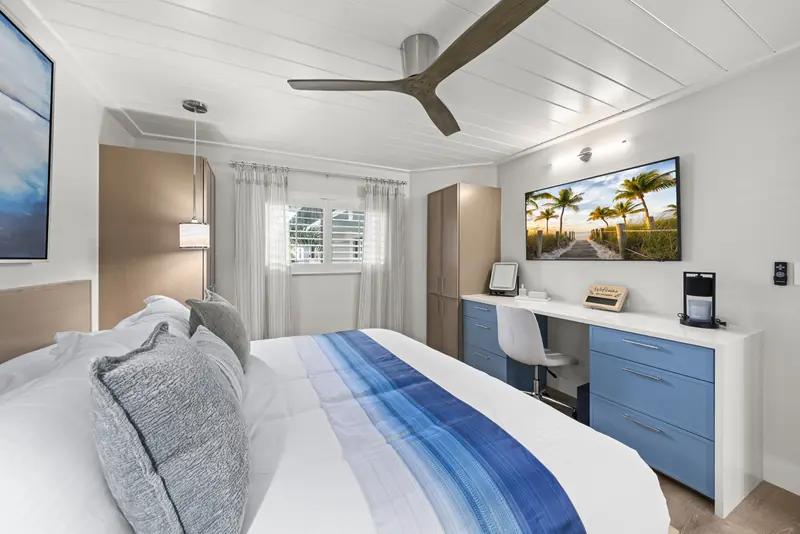 King bed with coastal linens