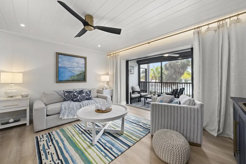 Designer living room with coastal artwork